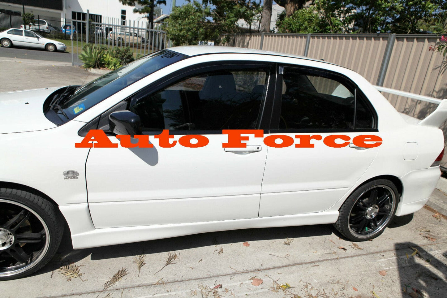 Installed view - Mitsubishi Lancer CH Sedan Weather Shields 2003-2007 - HIC Premium