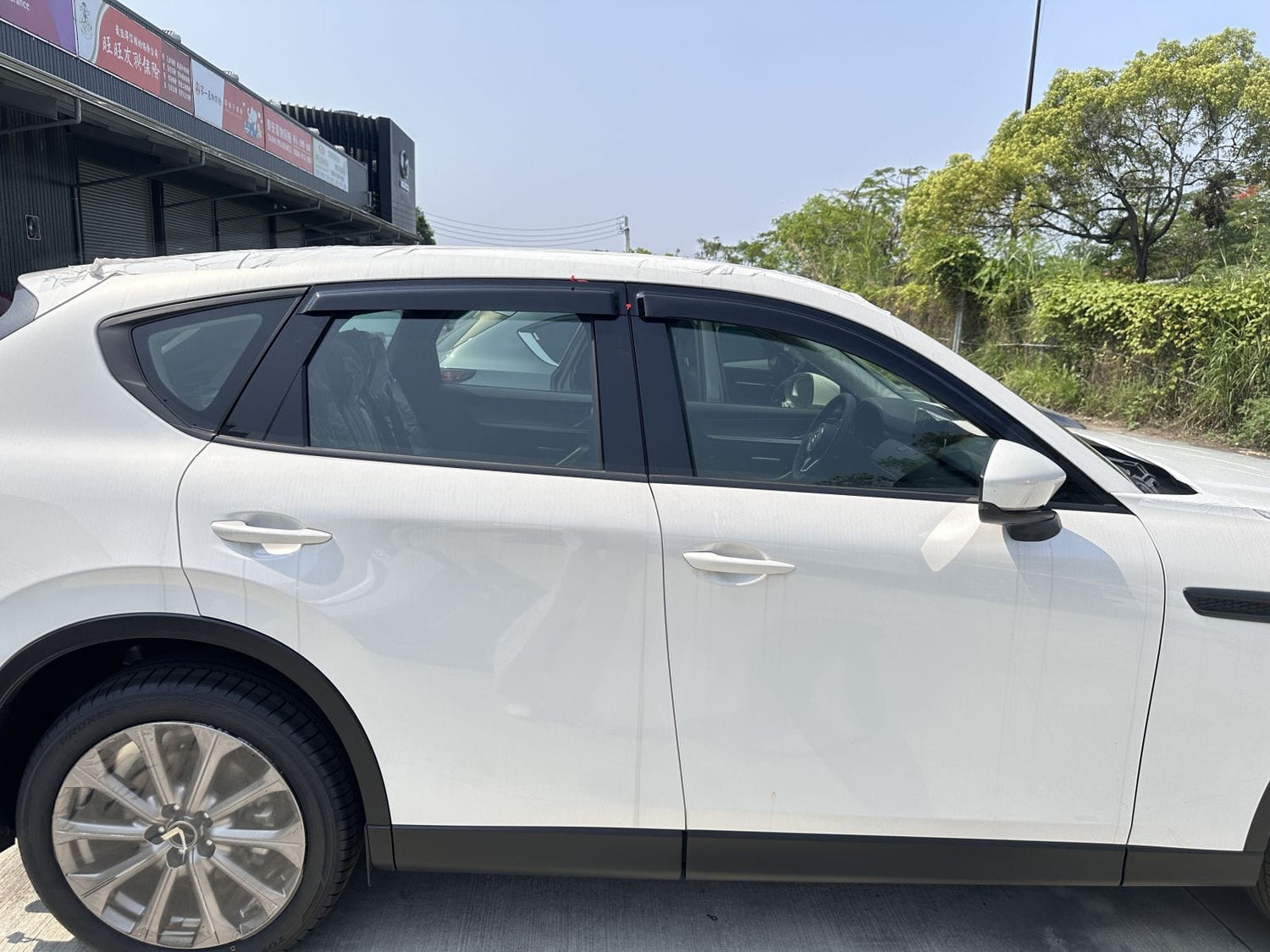 Mazda CX-60 weather shields 2023+ — black-tinted HIC visors with aerodynamic UV-resistant fitment for premium side-window protection