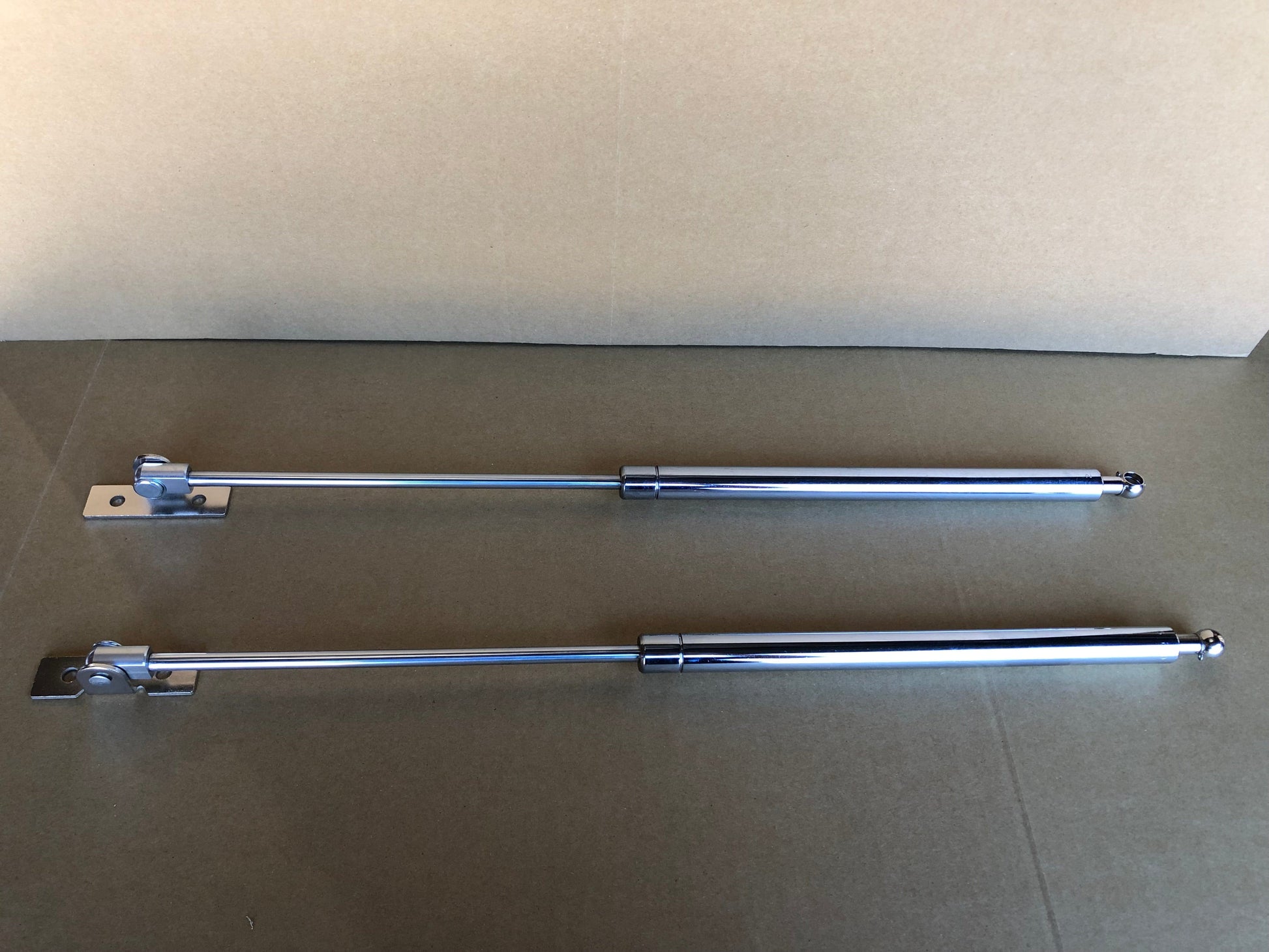 Installed view -  Holden Commodore VT VX VY VZ  Bonnet Gas Struts Chrome Premium