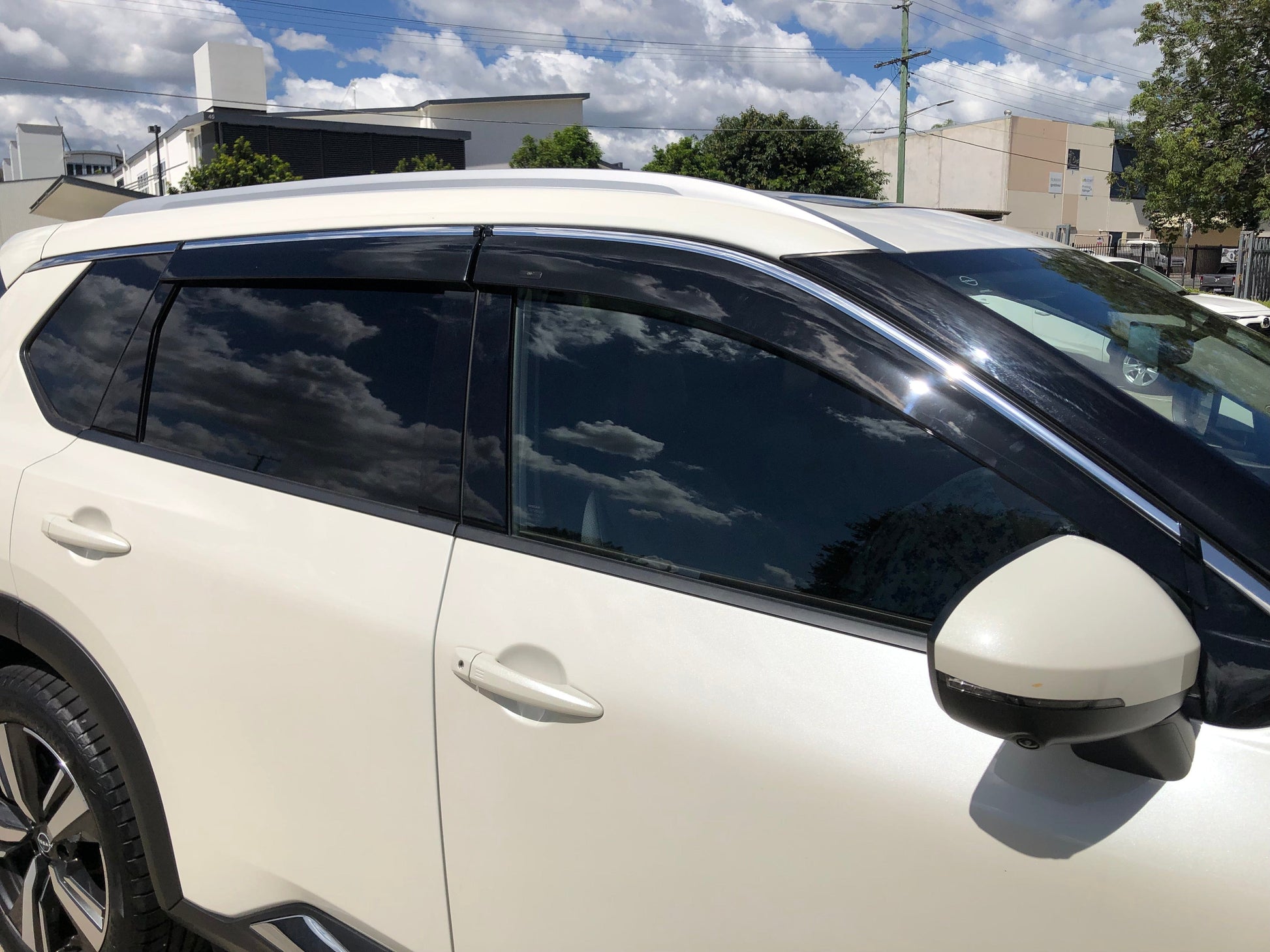 Installed view -  Nissan X-Trail T33 Weather Shields 2021-2026 with Chrome Trim - HIC Premium