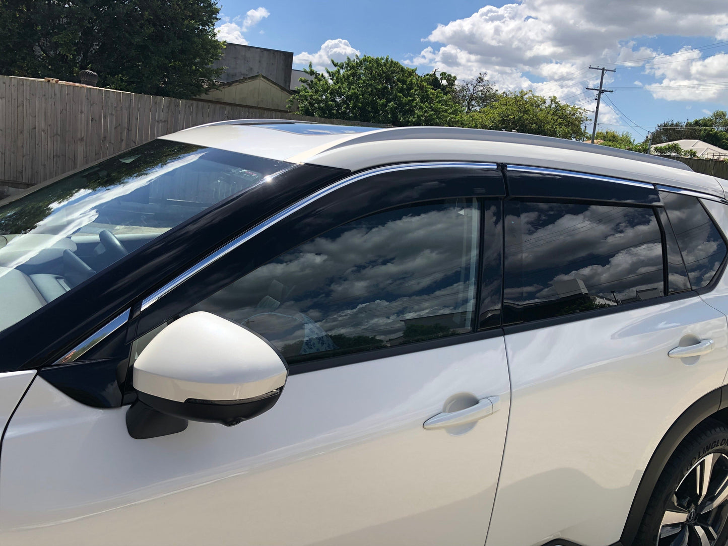 Installed view -  Nissan X-Trail T33 Weather Shields 2021-2026 with Chrome Trim - HIC Premium