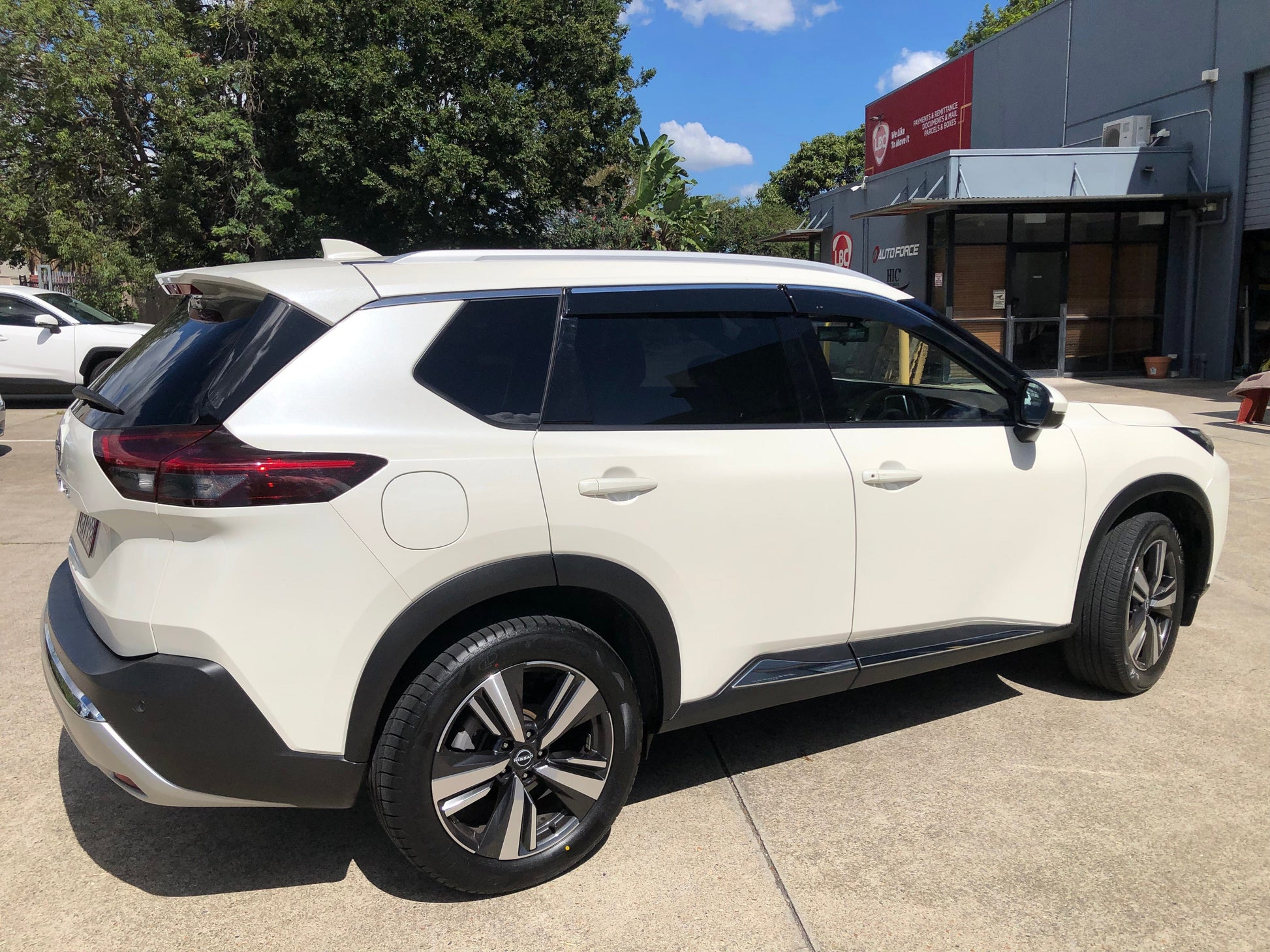 Installed view -  Nissan X-Trail T33 Weather Shields 2021-2026 with Chrome Trim - HIC Premium