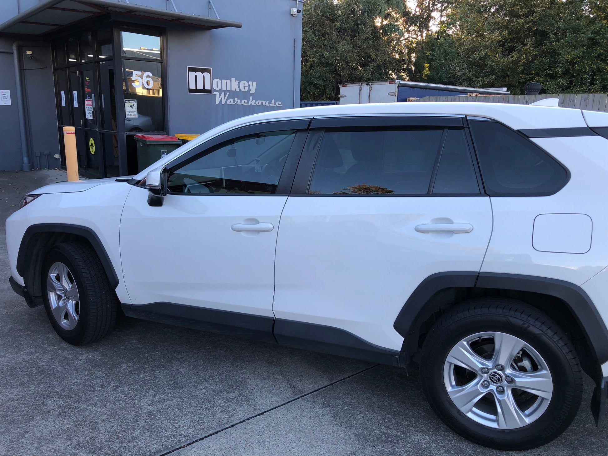Installed view -  Toyota RAV4 Weather Shields 2019-2025 with Chrome Trim - HIC Premium
