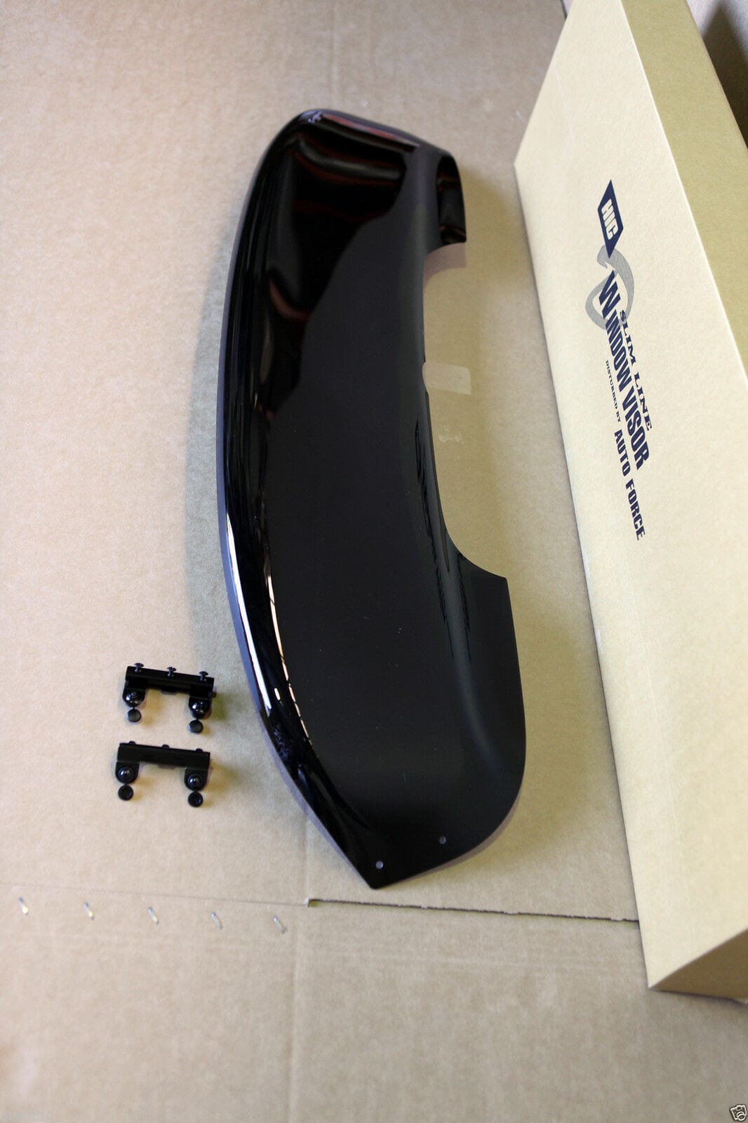 HIC Slim Line Window Visor by Auto Force, close-up with mounting clips
